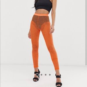 Orange fishnet leggings